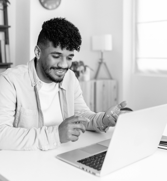 man looking at laptop