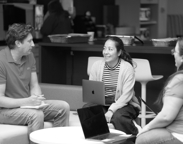 Employees talking in break area