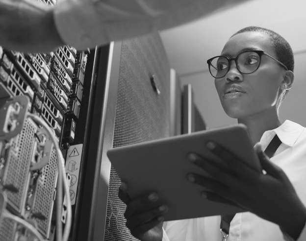 woman looking at server rack